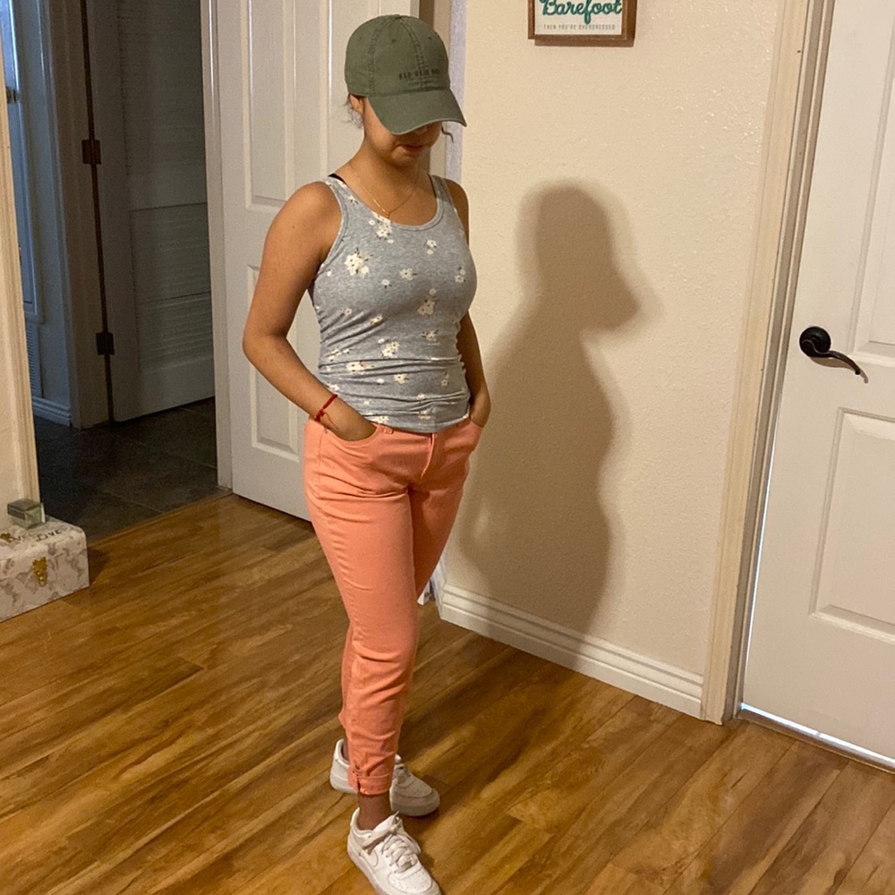 Melon/peach color jeans, size 4.